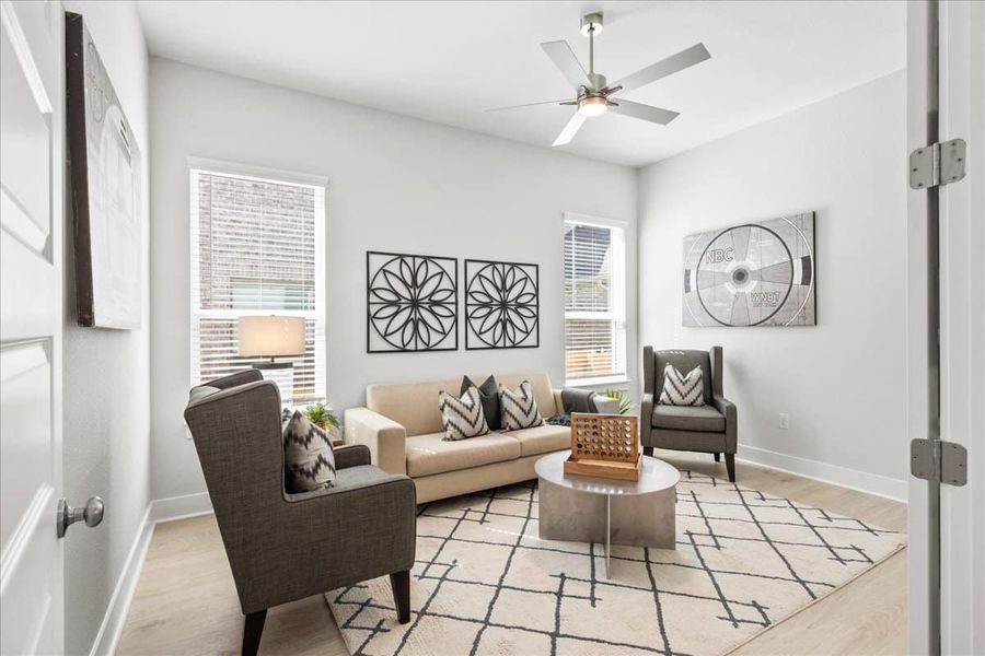 Representative furnished interior of a home built from the Draco by Chesmar Homes in The Grove at Blackhawk, Pflugerville (Image 5).