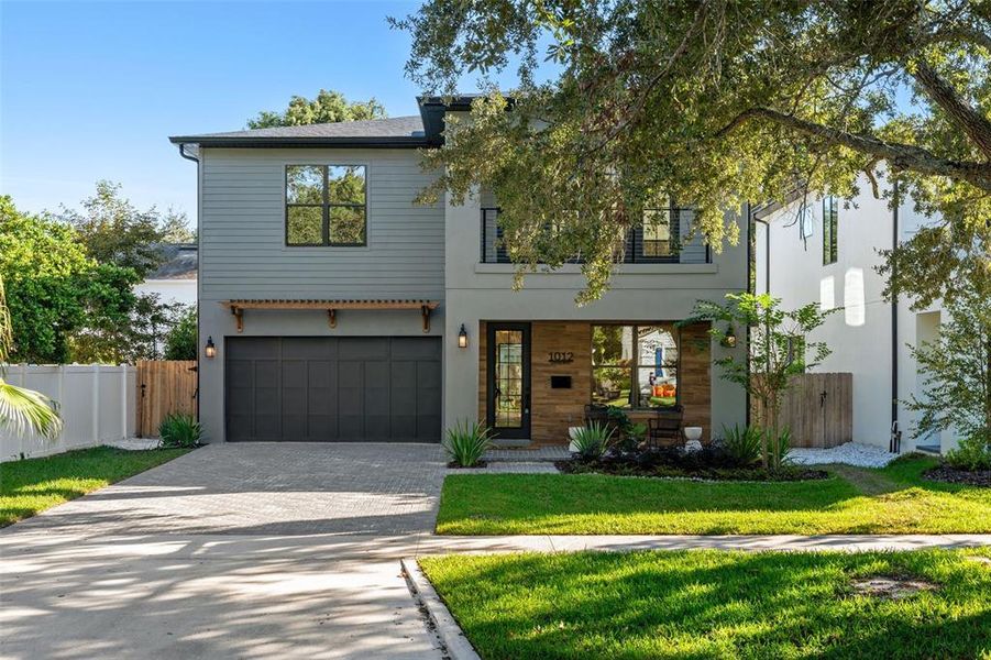 Front exterior of a new home in College Park, Orlando, FL, highlighting curb appeal (Image 1).