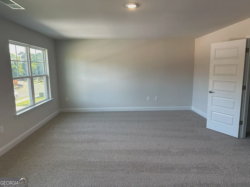 Spacious, unfurnished interior of a new home in Canterbury Villas, Carrollton (Image 13).