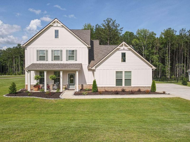 Front exterior of a new home in , Senoia, GA, highlighting curb appeal (Image 36). Front exterior of a new home in , Senoia, GA, highlighting curb appeal (Image 36).