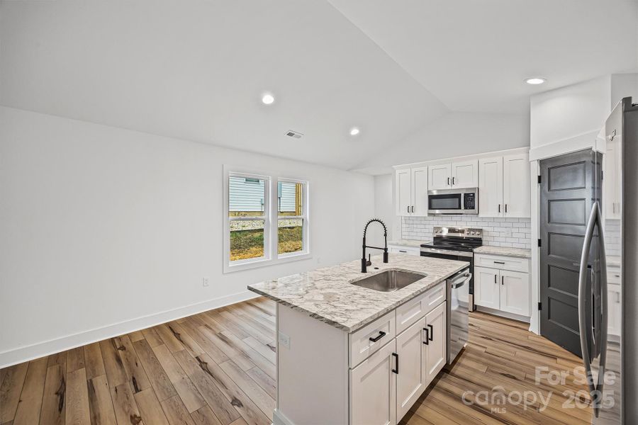 Furnished interior view inside a new home in , Concord (Image 10).
