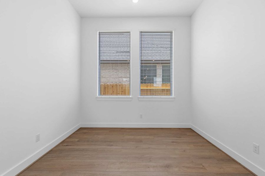 Spacious, unfurnished interior of a new home in Parkside on the River, Georgetown (Image 24).
