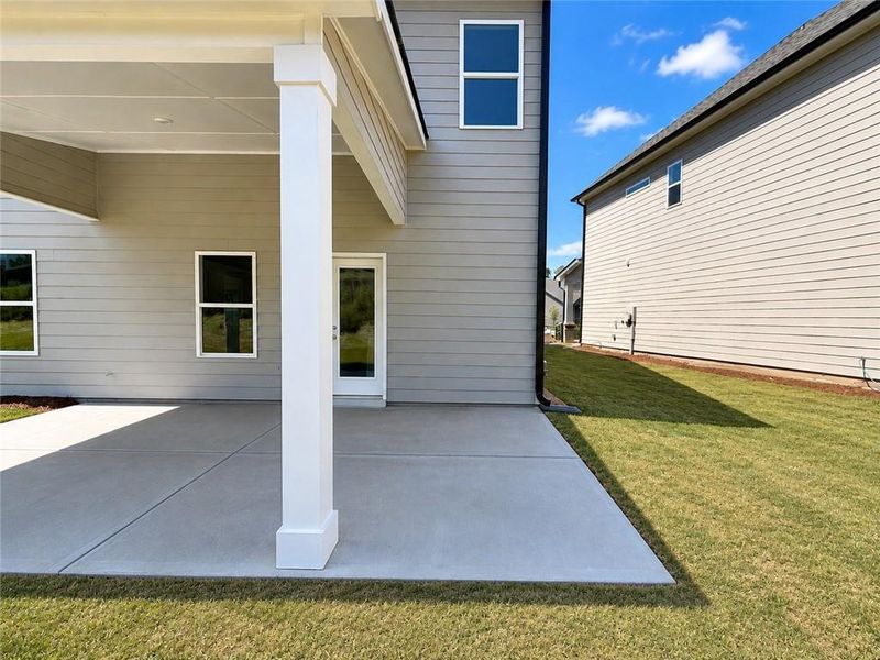 Exterior details and patio area of a home in Ponderosa Farms Estates, Gainesville (Image 22).