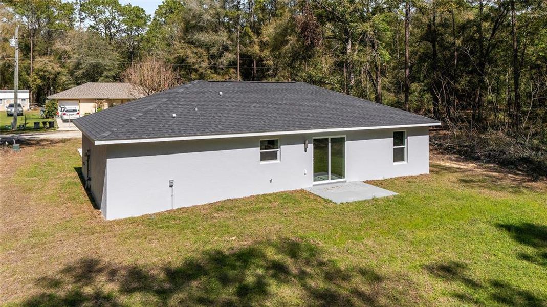 Exterior details and patio area of a home in , Ocala (Image 3).