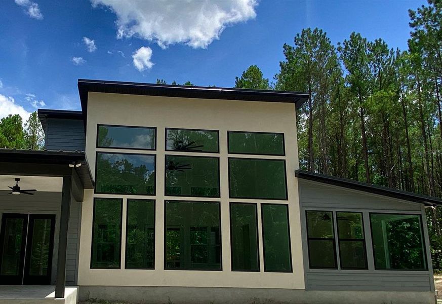 Front exterior of a new home in , Alachua, FL, highlighting curb appeal (Image 16). Front exterior of a new home in , Alachua, FL, highlighting curb appeal (Image 16).