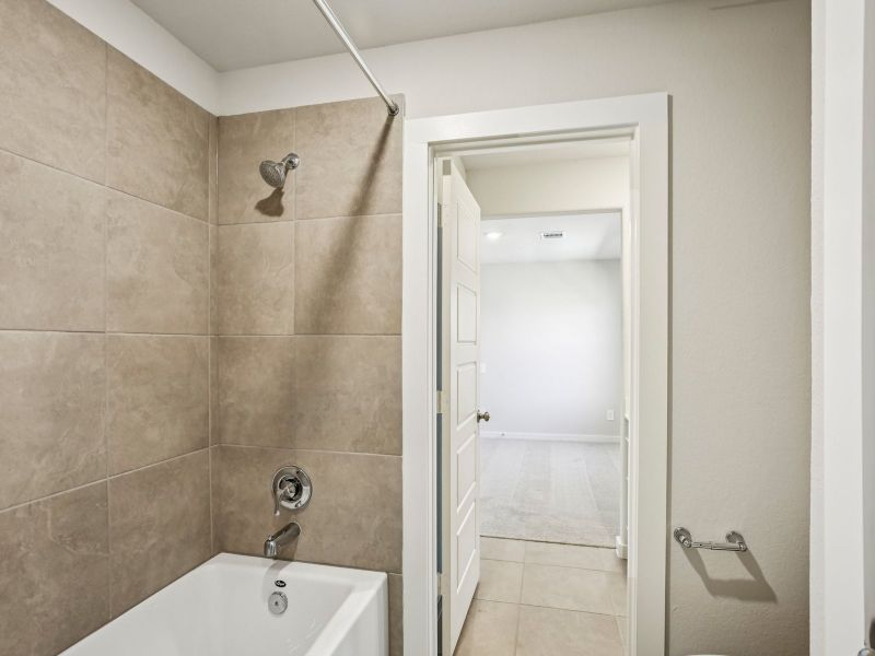 Furnished interior view inside a new home in Sundance Cove - Premier Series, Crosby (Image 12).