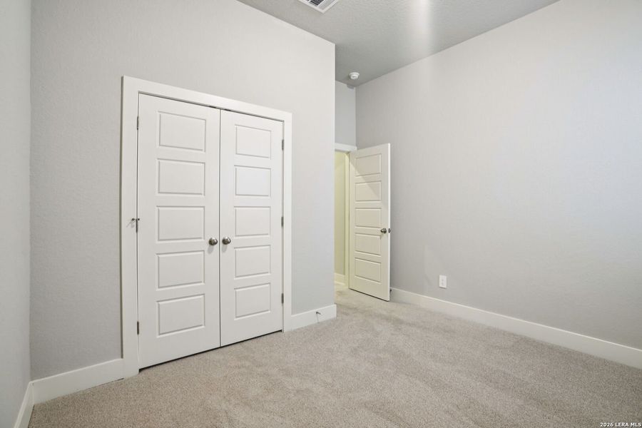 Spacious, unfurnished interior of a new home in Estancia Ranch - Classic Series, San Antonio (Image 36).