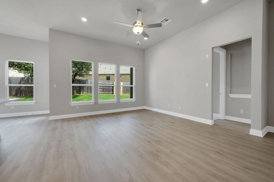 Unfurnished room with recessed lighting, light wood-type flooring, and a ceiling fan