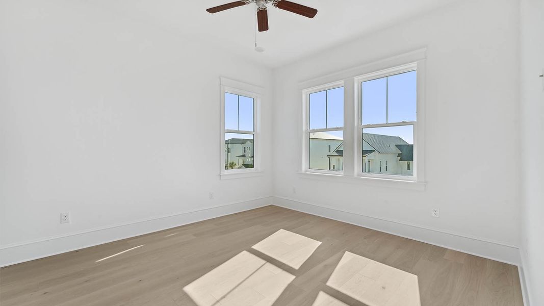 Representative unfurnished interior of a home built from the Cayman by D.R. Horton in Parkside, Santa Rosa Beach (Image 38).