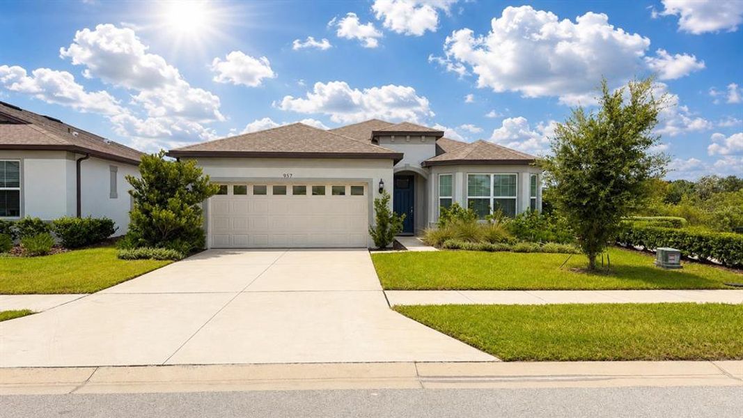 Front exterior of a new home in Silverlake, Lake Alfred, FL, highlighting curb appeal (Image 2). Front exterior of a new home in Silverlake, Lake Alfred, FL, highlighting curb appeal (Image 2).