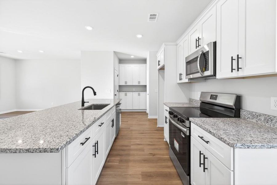 Furnished interior view inside a new home in , Commerce (Image 6).