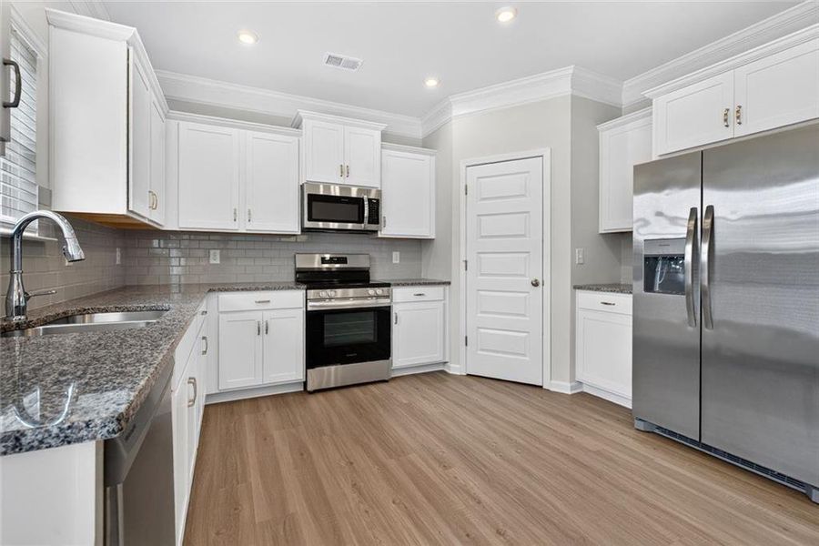 Furnished interior view inside a new home in Fuller Station, Loganville (Image 16).