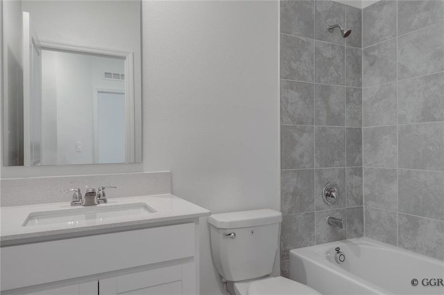 Furnished interior view inside a new home in , Davenport (Image 9).