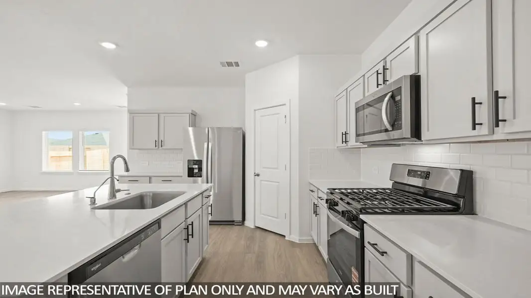 Furnished interior view inside a new home in New Waverly Station, New Waverly (Image 5).