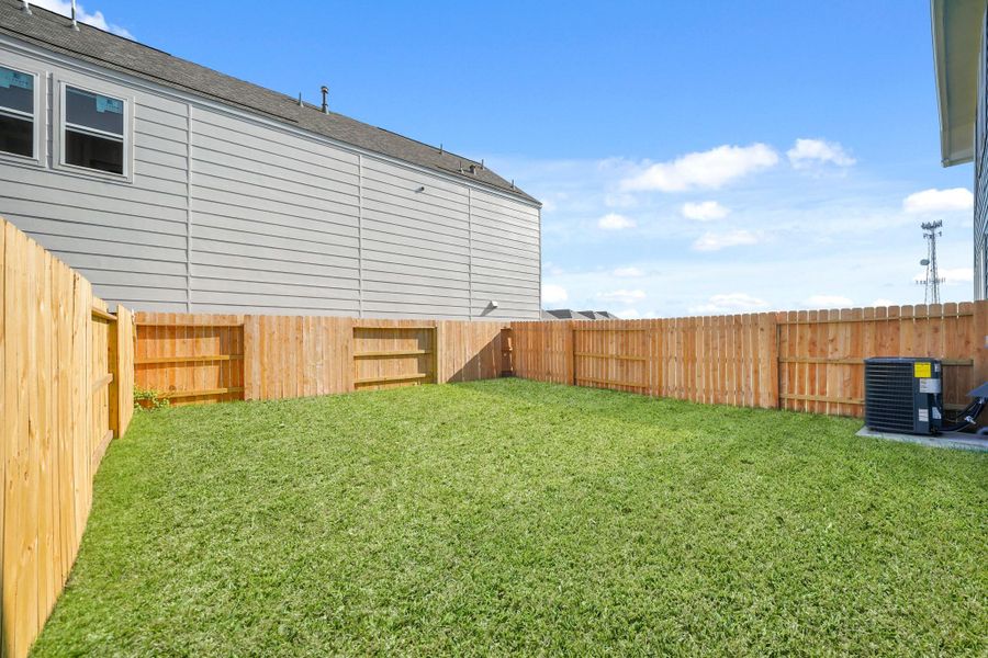 Exterior details and patio area of a home in Piccolina, Houston (Image 4).