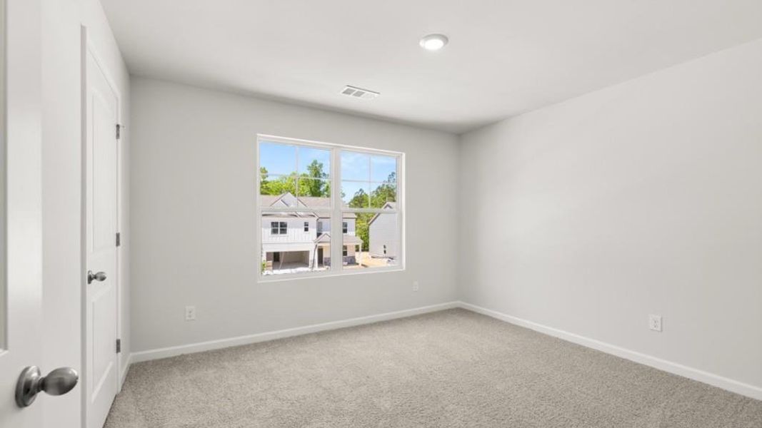 Spacious, unfurnished interior of a new home in Parkside at Carter Grove, Cartersville (Image 27).
