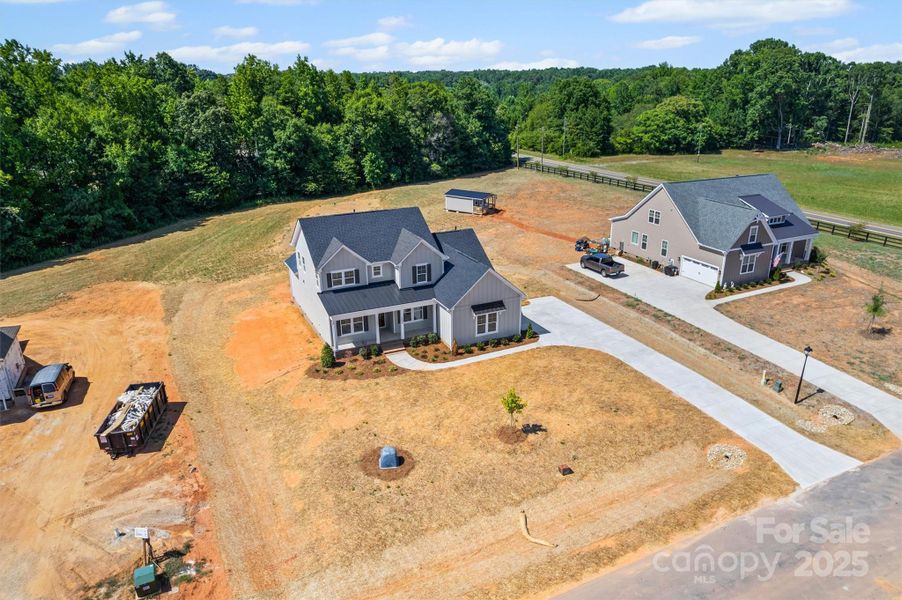 Front exterior of a new home in , Gastonia, NC, highlighting curb appeal (Image 1).