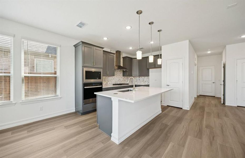 Spacious kitchen with pendant lighting Spacious kitchen with pendant lighting
