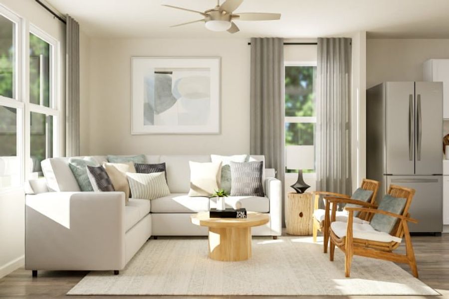 A living room with a couch and a table.