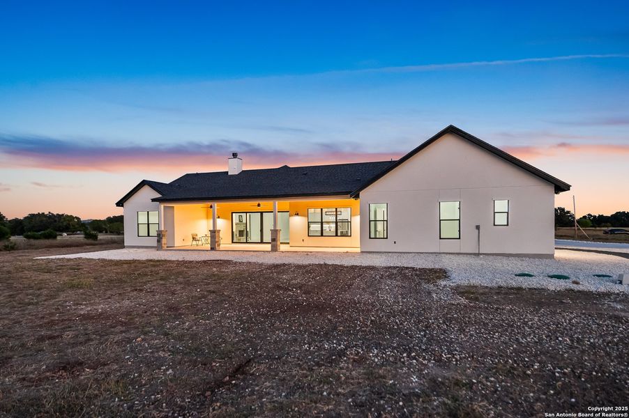 Exterior details and patio area of a home in , Bandera (Image 3).