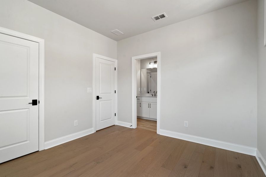 Representative unfurnished interior of a home built from the 
                        
                         by The Providence Group in Ward's Crossing Townhomes, Johns Creek (Image 18).