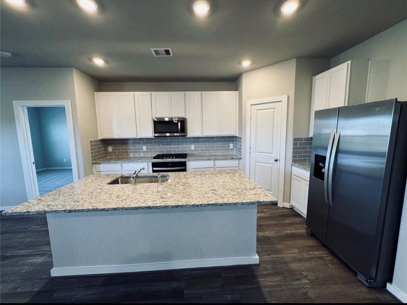 Furnished interior view inside a new home in Arabella on the Prairie, Richmond (Image 6).