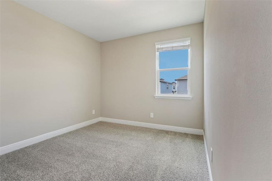 Spacious, unfurnished interior of a new home in Silverleaf Reserve Bungalows, Winter Garden (Image 27).