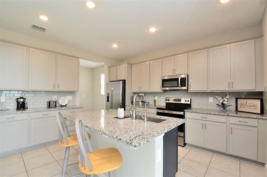 Furnished interior view inside a new home in Seasons at Eden Hills, Lake Alfred (Image 13).