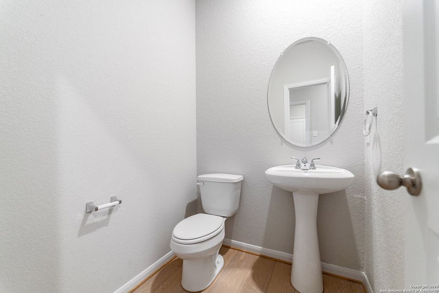 Furnished interior view inside a new home in Hennersby Hollow, San Antonio (Image 4).