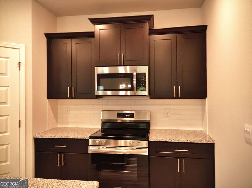 Furnished interior view inside a new home in Barrington Place, Macon (Image 3).