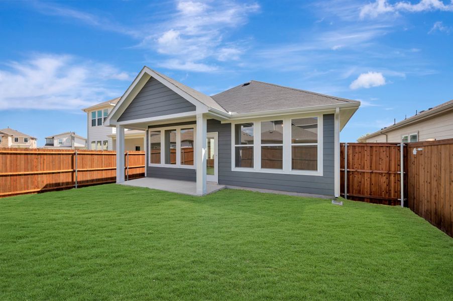 Exterior details and patio area of a home in The Meadows, Denton (Image 19).