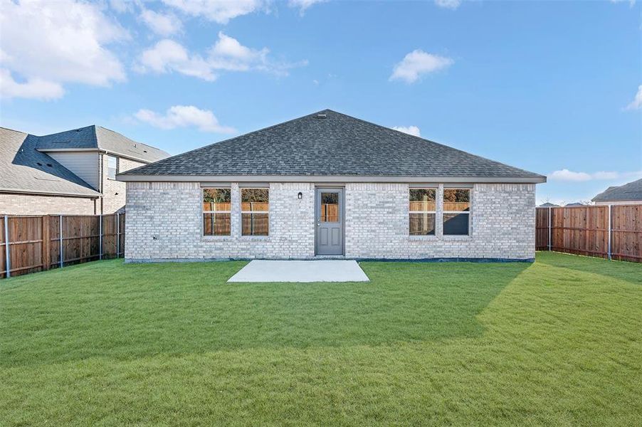 Exterior details and patio area of a home in Kings Way, Denton (Image 3).