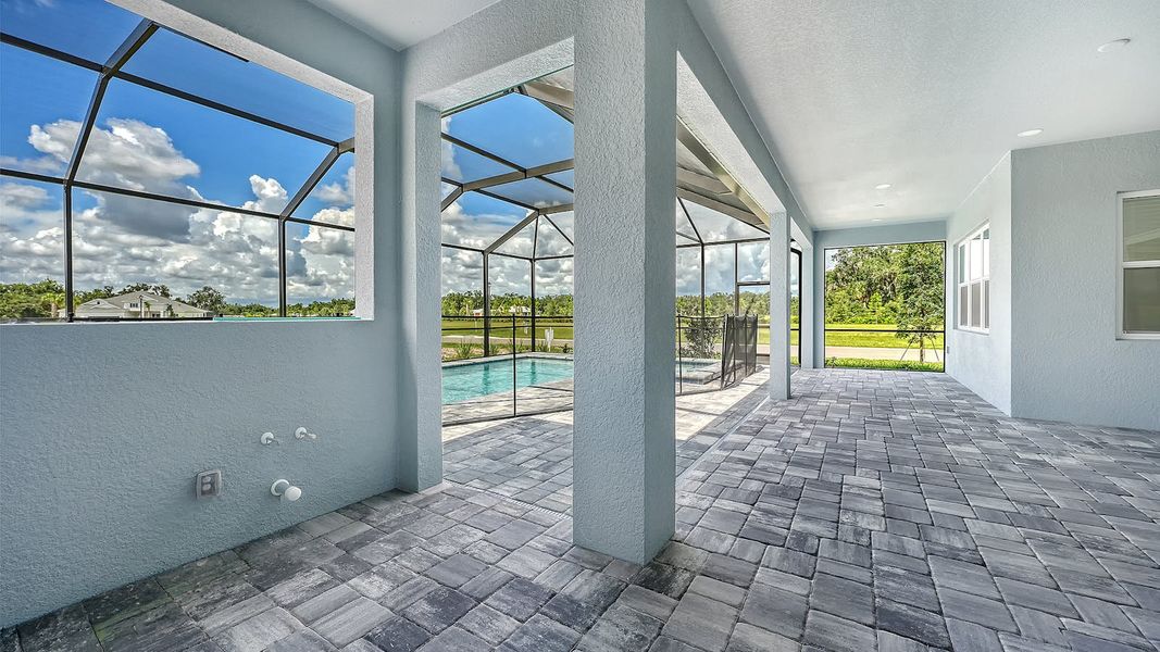 Exterior details and patio area of a home in Canoe Creek Real Estate and Homes for Sale in Parrish, FL - Neal Communities, Parrish (Image 31).