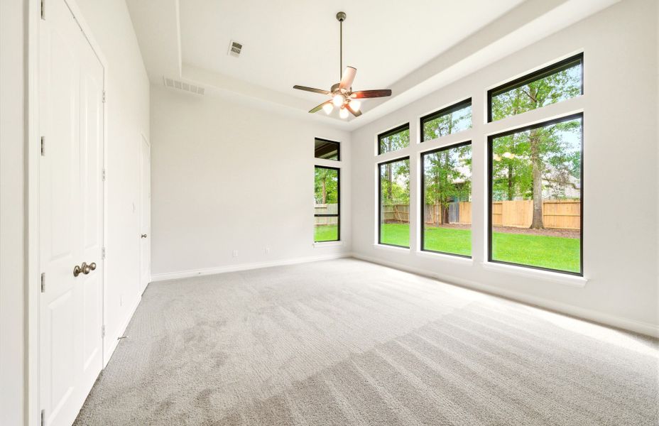 Spacious, unfurnished interior of a new home in The Woodlands Hills 65′, Willis (Image 50).