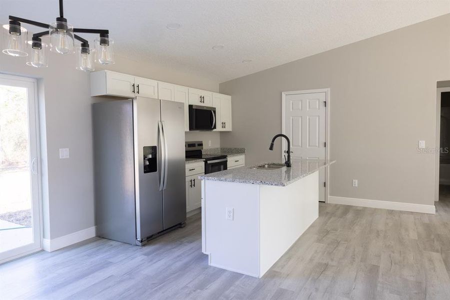 Furnished interior view inside a new home in , Citrus Springs (Image 4).
