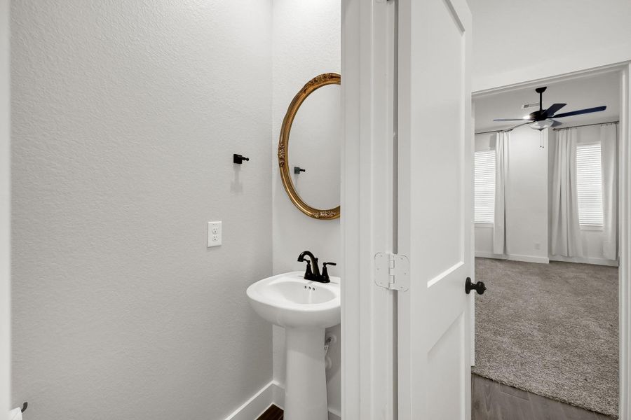 Furnished interior view inside a new home in The Woodland Hills 50', Willis (Image 8). Furnished interior view inside a new home in The Woodland Hills 50', Willis (Image 8).