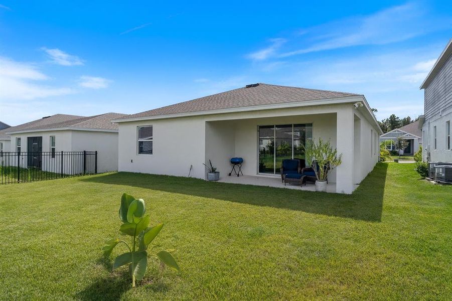 Exterior details and patio area of a home in Providence: Garden Hills Estate Collection, Davenport (Image 20).