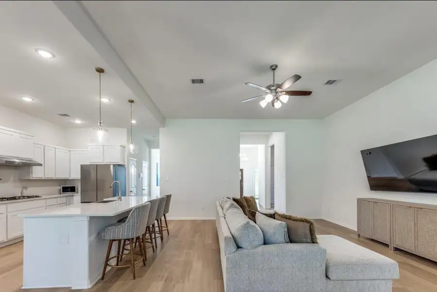 Furnished interior view inside a new home in Deer Pines, Conroe (Image 7).