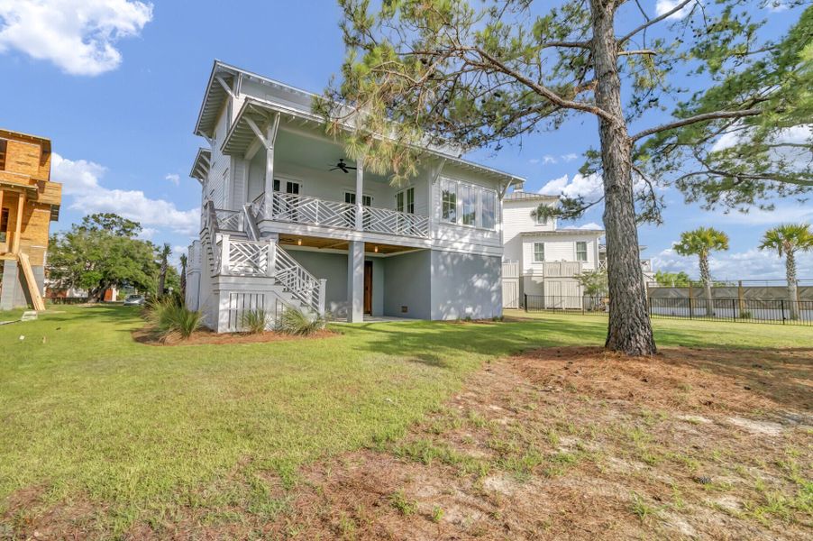 Exterior details and patio area of a home in , Johns Island (Image 32).