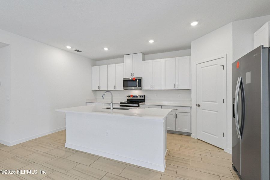 Furnished interior view inside a new home in , Jacksonville (Image 13).