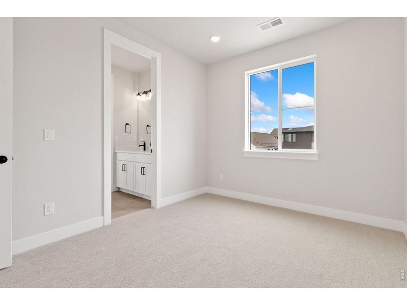 Spacious, unfurnished interior of a new home in RainDance, Windsor (Image 10).
