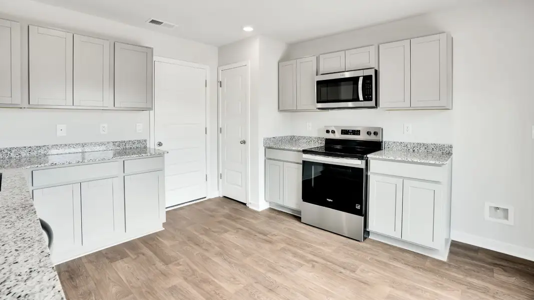 Furnished interior view inside a new home in Lockwood Landing, Supply (Image 7).