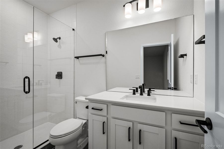 Furnished interior view inside a new home in Wolf Ranch - Enclave Collection, Colorado Springs (Image 27).