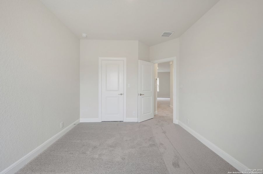 Spacious, unfurnished interior of a new home in Windsong - Reserve Series, Boerne (Image 36).