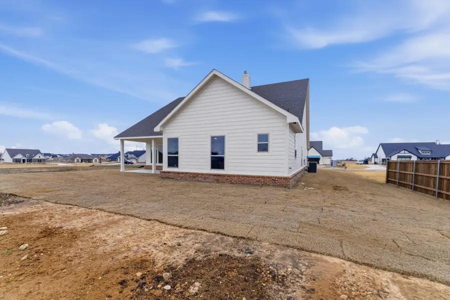 Exterior details and patio area of a home in Fairview Meadows, New Fairview (Image 17).