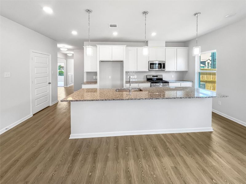 Furnished interior view inside a new home in Sierra Vista, Iowa Colony (Image 5).