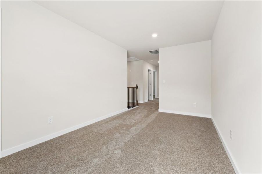 Spacious, unfurnished interior of a new home in Fern Dale, Fairburn (Image 23).