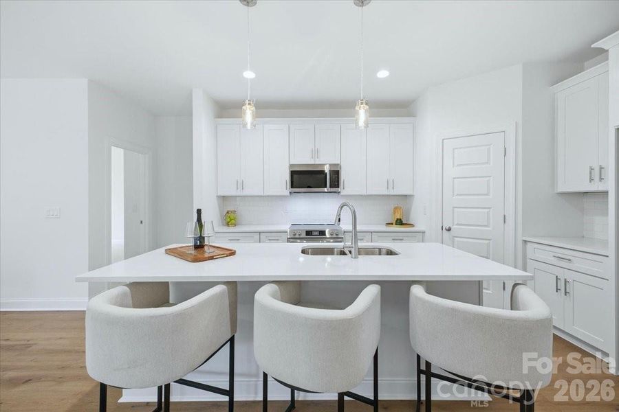 Furnished interior view inside a new home in , Denver (Image 8). Furnished interior view inside a new home in , Denver (Image 8).