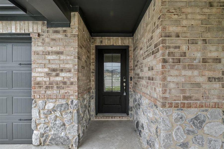 Exterior details and patio area of a home in Lakehaven - Signature Series, Farmersville (Image 22). Exterior details and patio area of a home in Lakehaven - Signature Series, Farmersville (Image 22).