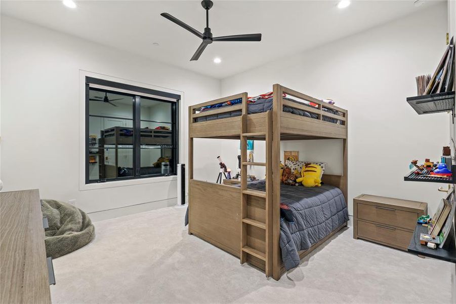 Bedroom with light carpet, recessed lighting, and ceiling fan Bedroom with light carpet, recessed lighting, and ceiling fan